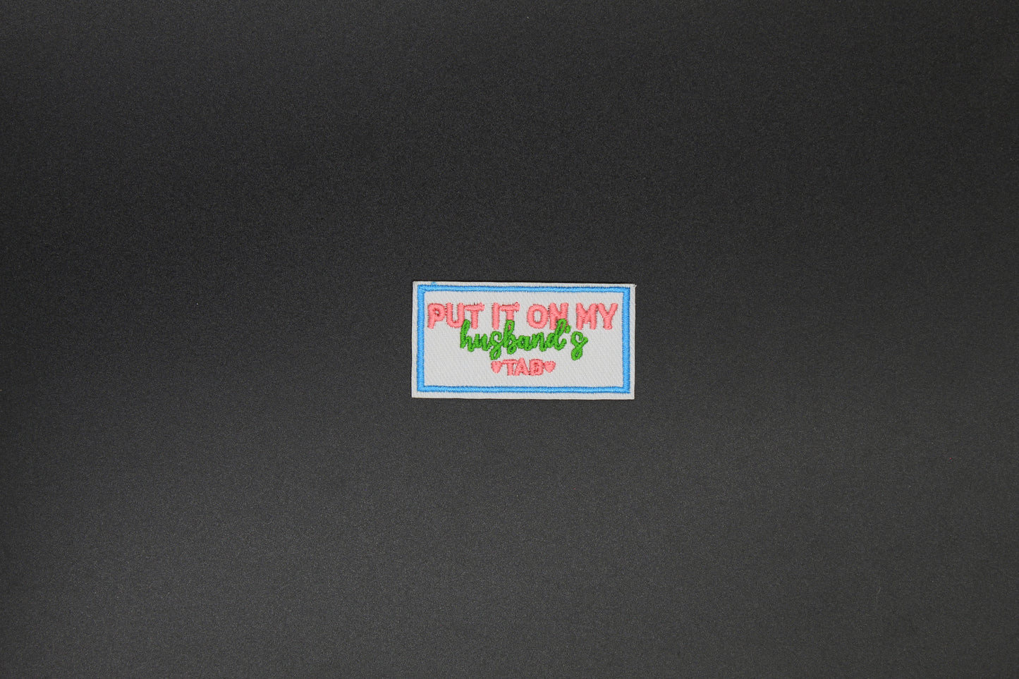 Put It On My Husband’s Tab Iron-On Patch