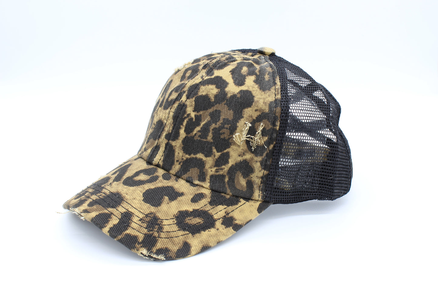 Distressed Cheetah Pattern Criss-Cross Ponytail Hat