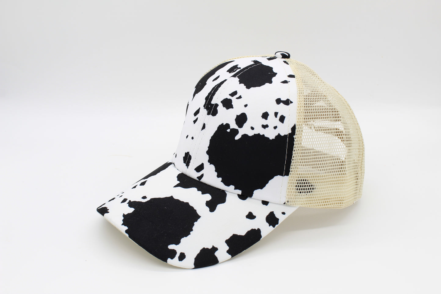 Classic Cow Print Criss-Cross Ponytail Hat