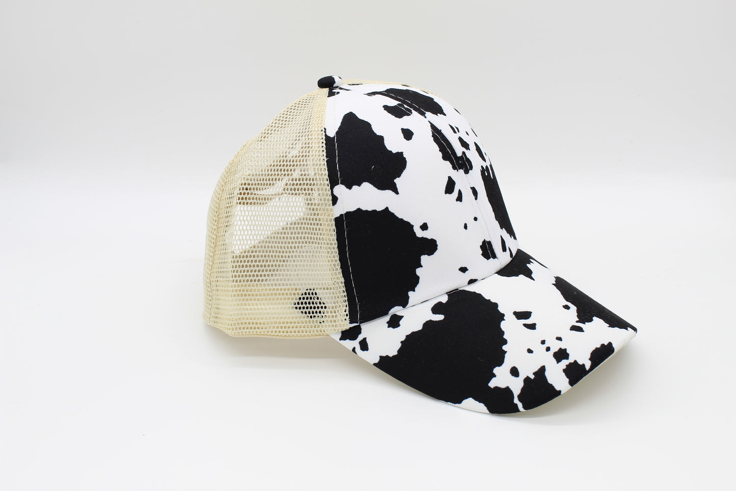 Classic Cow Print Criss-Cross Ponytail Hat