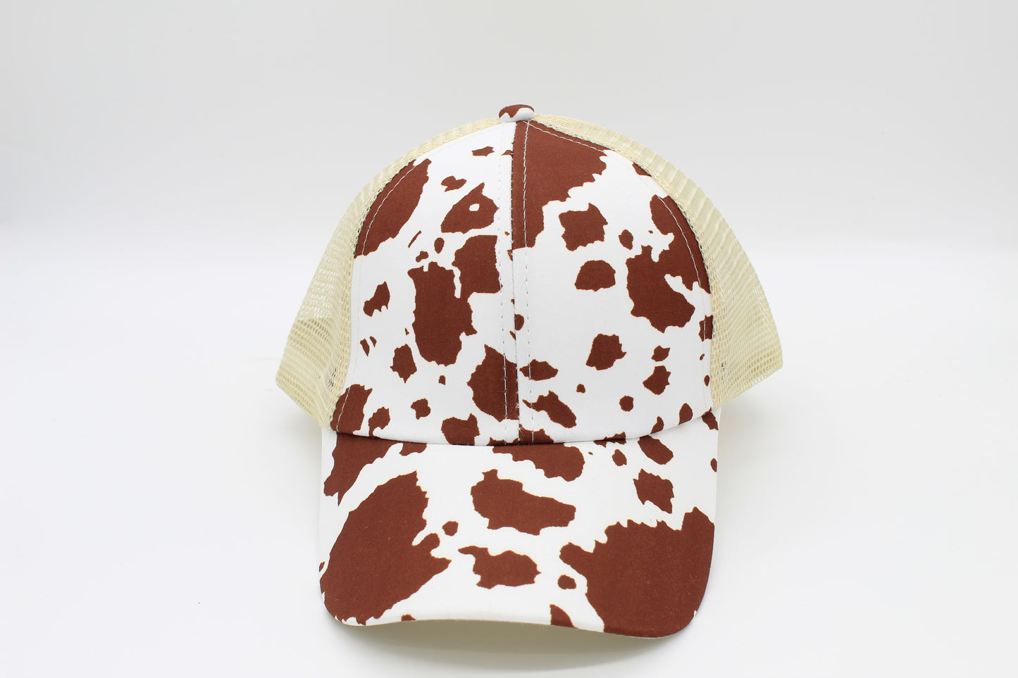 Brown Cow Print Criss-Cross Ponytail Hat