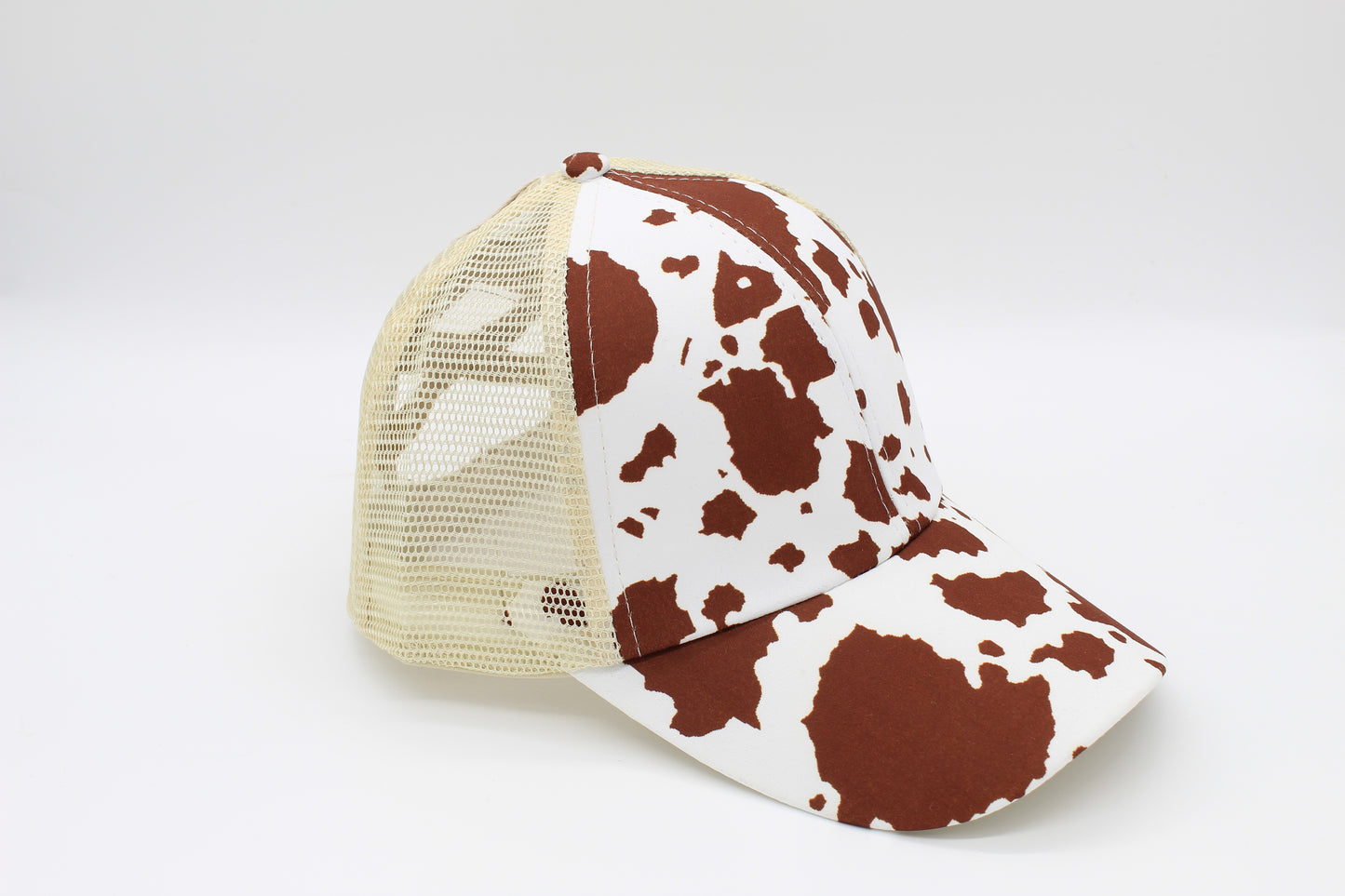 Brown Cow Print Criss-Cross Ponytail Hat