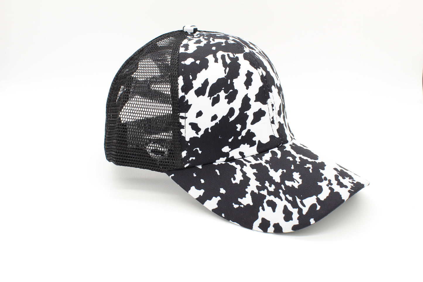 Midnight Ranch Cow Print Criss-Cross Ponytail Hat