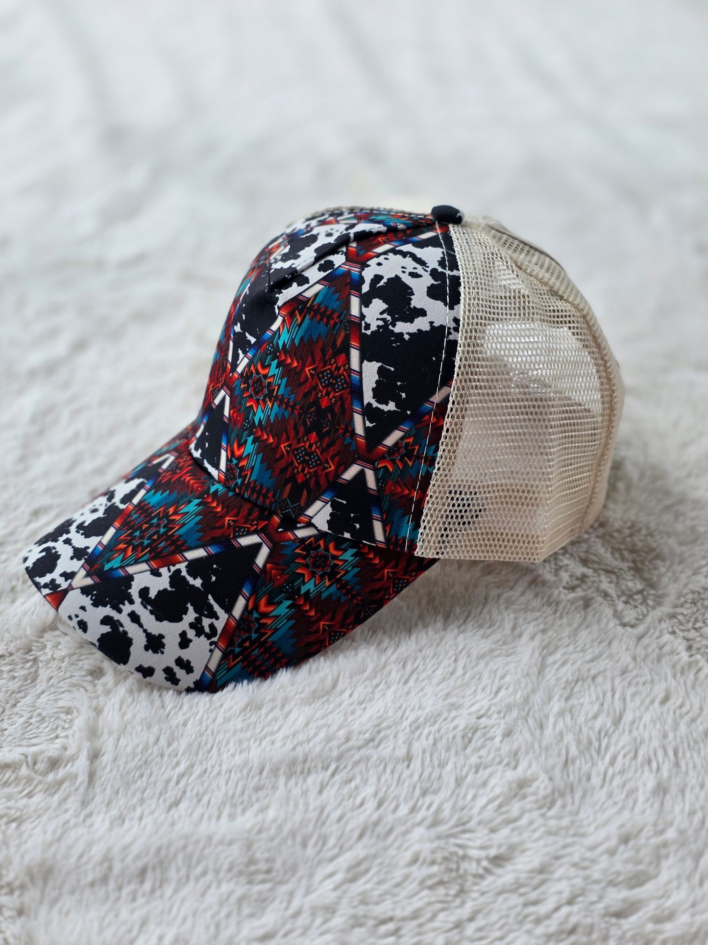 Southwestern Cow Print Criss Cross Ponytail Hat