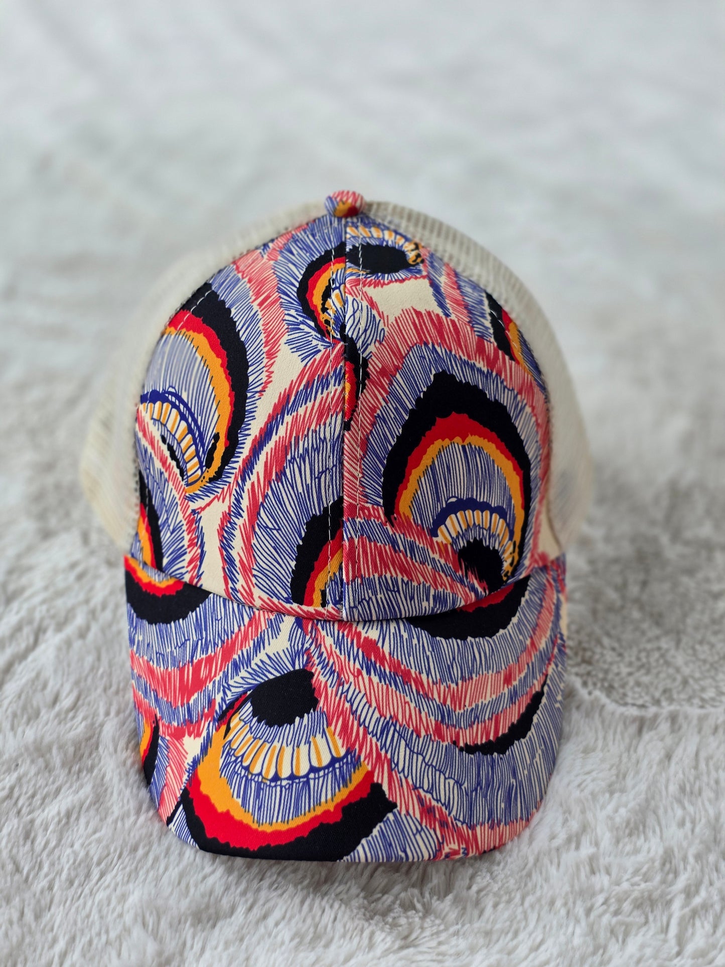 Abstract Rainbow Criss Cross Ponytail Hat