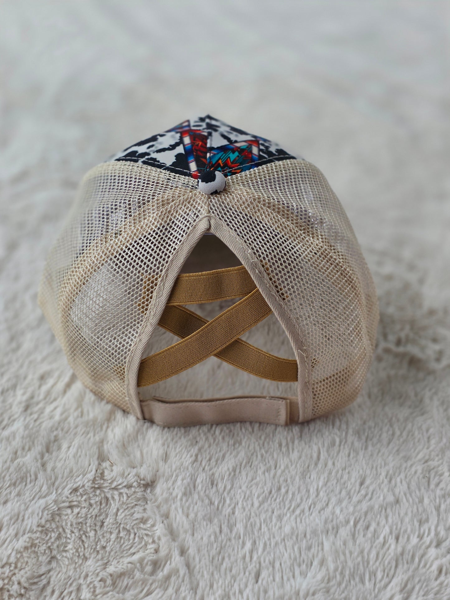 Southwestern Cow Print Criss Cross Ponytail Hat