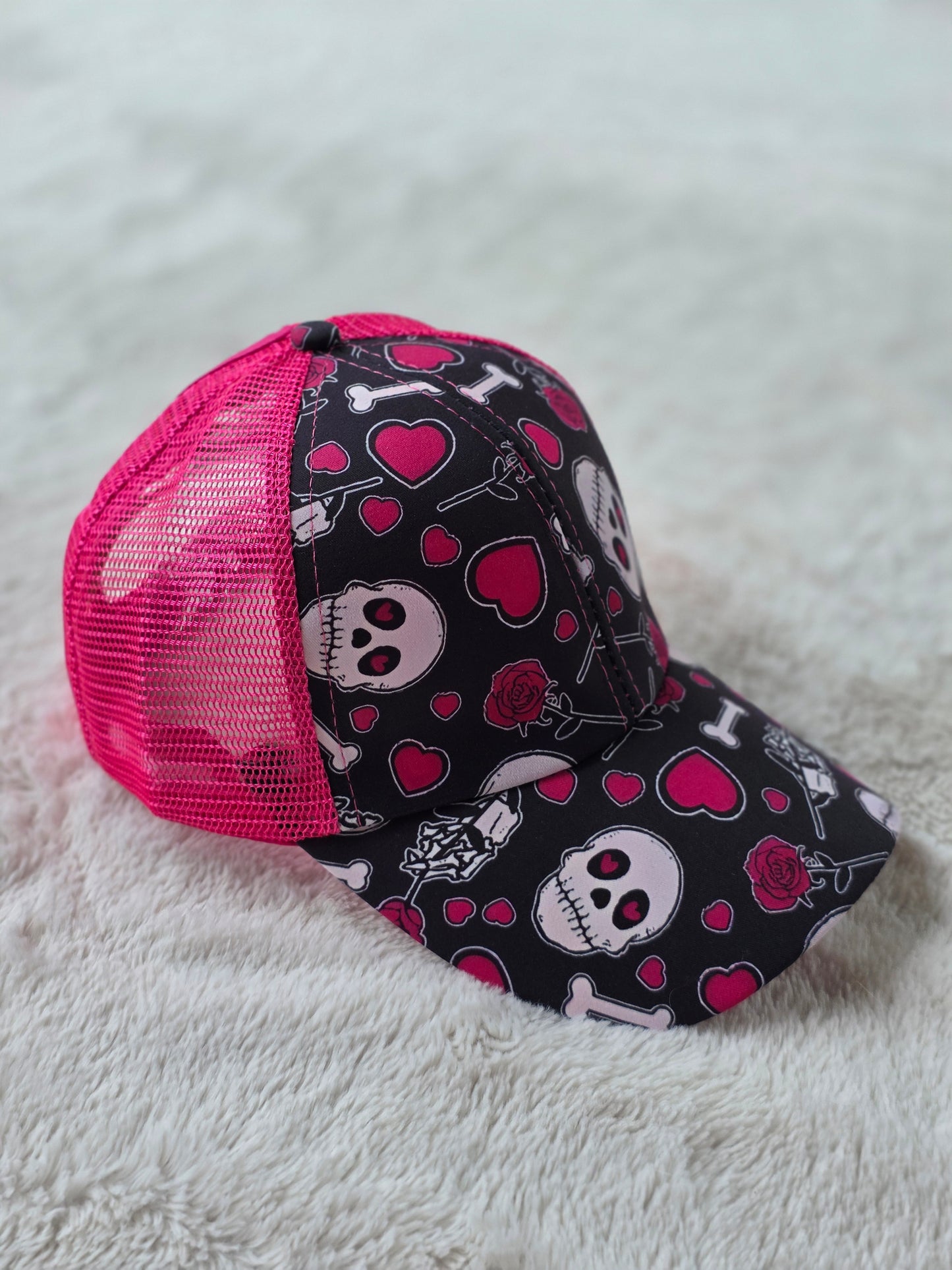 Pink Skull Criss Cross Ponytail Hat