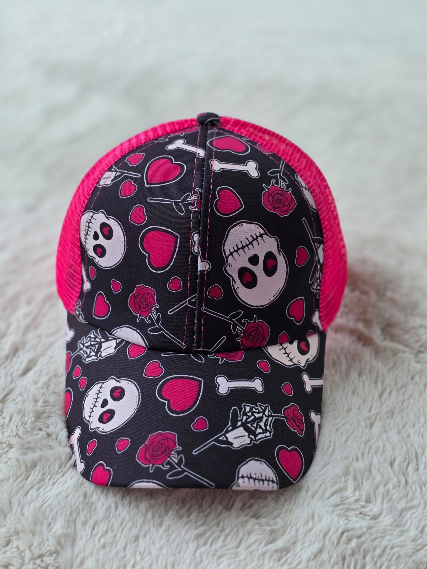 Pink Skull Criss Cross Ponytail Hat